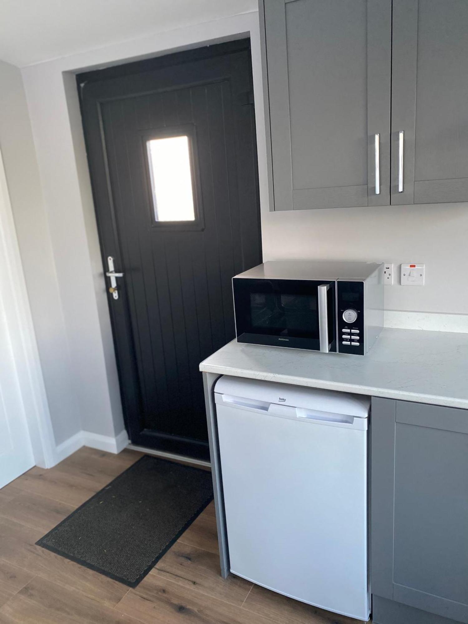 Killyfole Lakeside Lodges Corranny ภายนอก รูปภาพ